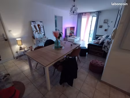 t3 de 61 m² - vendu loué - avec balcon + parking privé en sous-sol - dpe c