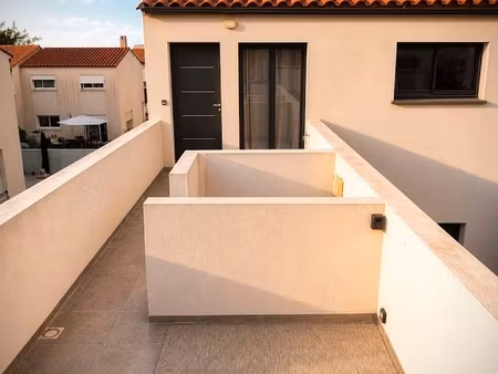 appartement f3 + terrasse + place de parking
