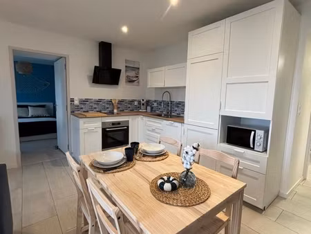 maison divisée en 2 appartements