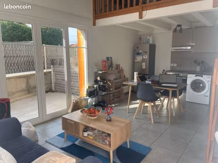 t2 avec mezzanine et jardin cloturé