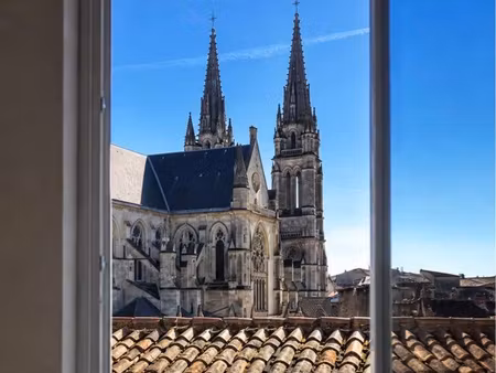 vue exceptionnelle sur la basilique des chartrons – t2 d’exception rénové