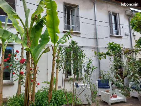 maison mitoyenne avec terrasse et jardin en plein grenoble