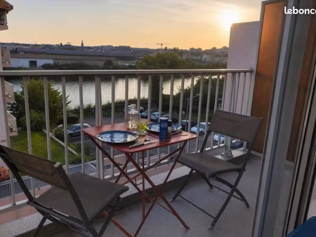 studio avec balcon vue seine - 23 m2 - ile lacroix - eau chaude et chauffage compris