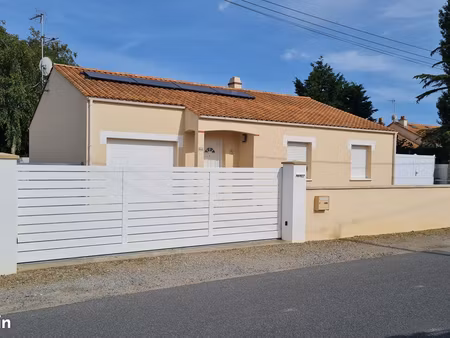 maison avec véranda et garage au cormier