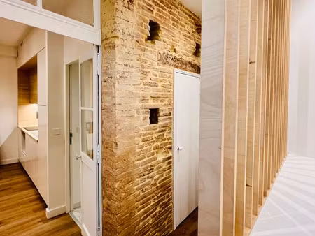 t2 rénové à neuf avec balcon – hyper-centre carmes (calme)