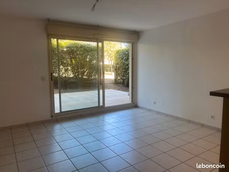 appartement t2 à grézieu la varenne avec jardin privatif et double garage