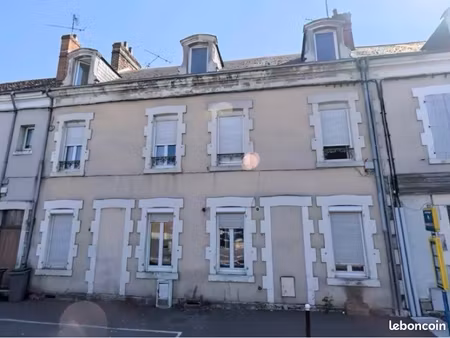 ensemble immobilier complet – immeuble + maison + 15 garages 100% loué
