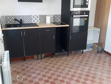 maison de ville de 2 chambres avec terrain