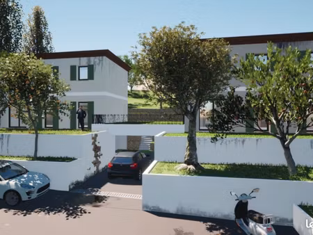 terrain avec pc pour deux maisons