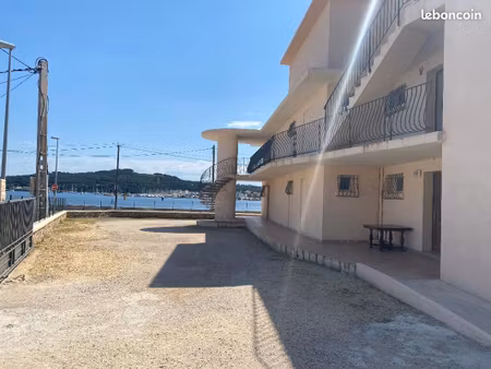 terrain de 1100 m2 a batir avec un immeuble a demolir