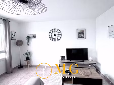 appartement actuellement loué type 4 avec garage  balcon et cave.