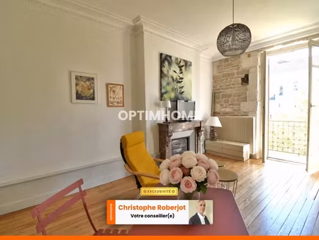 appartement hausmannien de 79m2 avec balcon et vue sur chalon