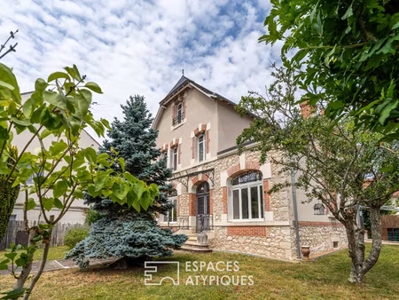 maison de ville des années 30 avec jardin et garage