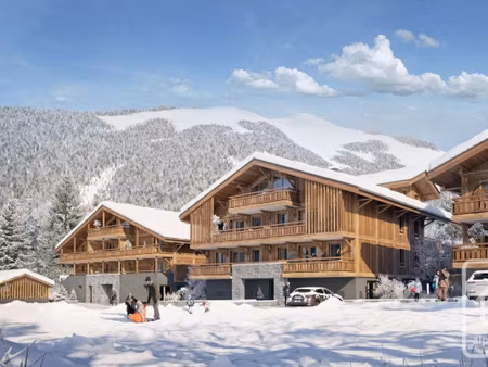 un super programme de 31 appartements neufs  proche du ski-bus et à distance de marche du.