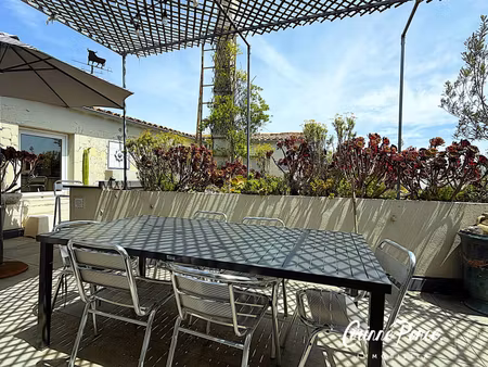 nimes centre historique dernier etage p3/p4 92 m2 terrasse40m2 propose par corinne ponce..