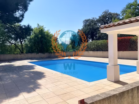 appartement en rez-de-jardin avec piscine et garage