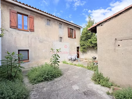 grande maison avec deux appartements