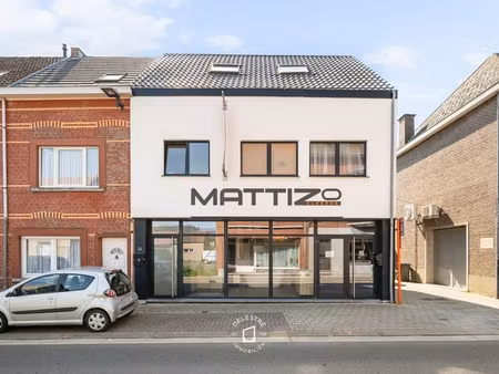 erg ruime kwalitatief verhuurde handelswoning + grond of ...