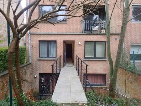 apt +/-90m²~2ch~balcon~empl. pkg ~ cave ~ jardin commun