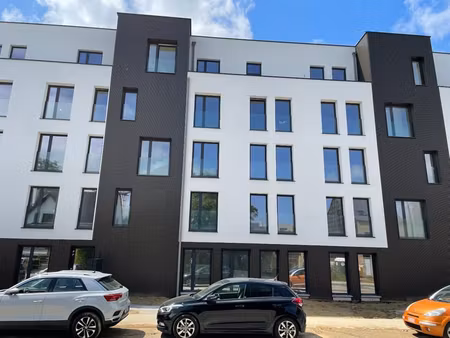appartement récent + place de parking et cave