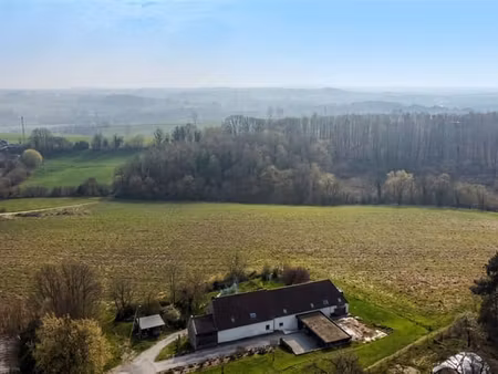 terrain à bâtir de 9 ares 95 ca dans un cadre verdoyant