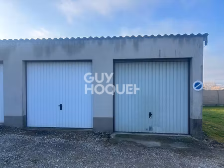 parking / box echenoz la meline 12 m2 n°1