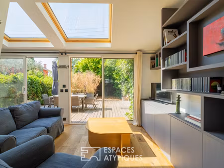duplex contemporain  comme une maison proche du centre ville