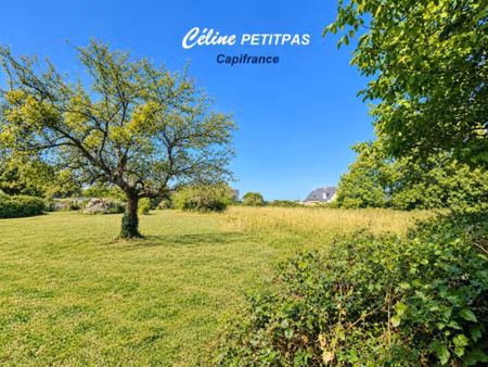 terrain constructible de 1600m² quédillac (35)