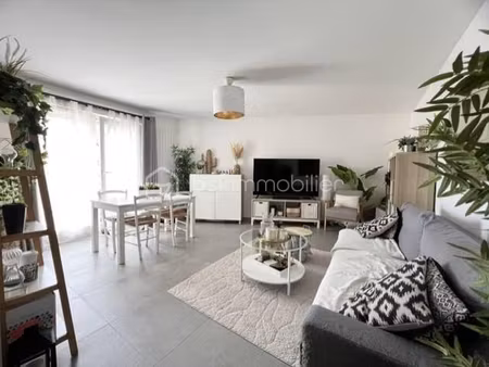 appartement 3 chambres - balcon - place de stationnement