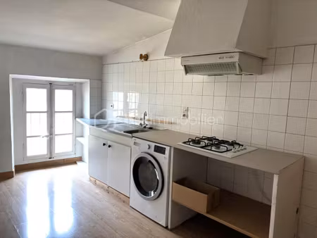 immeuble 3 appartements + 1 local commercial