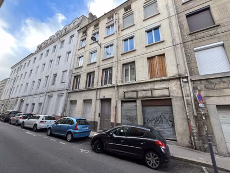 immeuble de 7 appartements et 1 local + combles aménageables