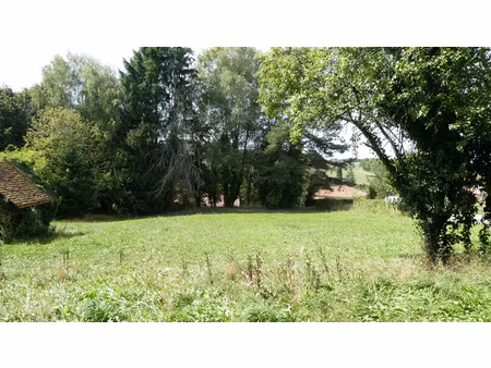 belle parcelle de 1555 m2 proche centre bourg