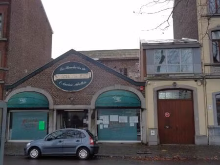 maison de commerce avec possibilite de construction