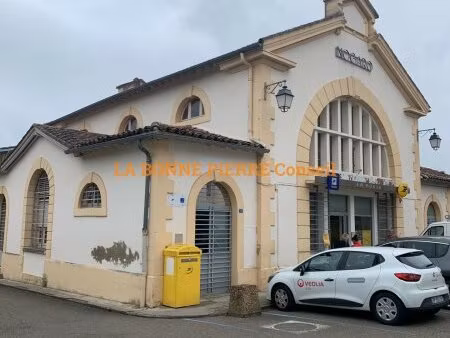 immeuble de rendement mixte  loué par la poste