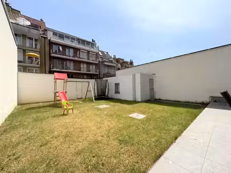 gelijkvloers appartement met 3-slaapkamers en tuin in het...