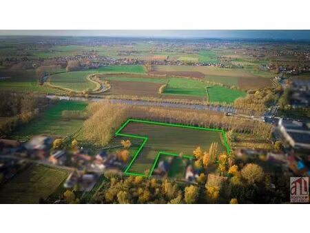 magnifique terrain en zone constructible (en partie) sur 1h