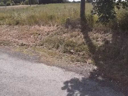 terrain à bâtir avec cu champagnac de belair bord de route
