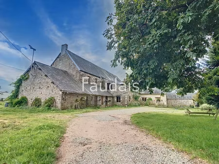 propriété avec deux logements et grand potentiel d'agrandiss