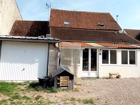 maison 3 chambres  avec garage et terrain.