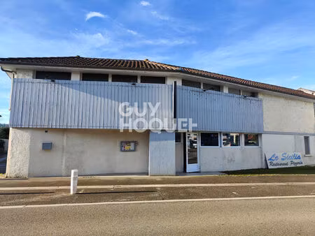 local commercial loué et logements à créer