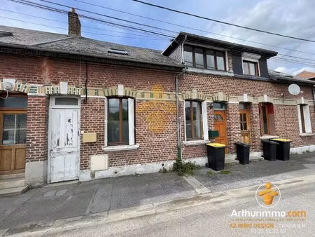 maison mitoyenne composée de deux appartements