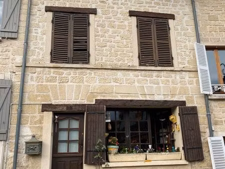 maison de ville en pierre de taille avec poutre