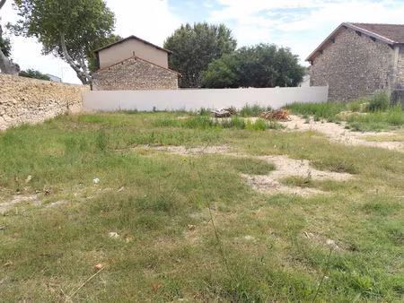 jonquieres saint vincent - terrain 559m2 viabilise et clotur