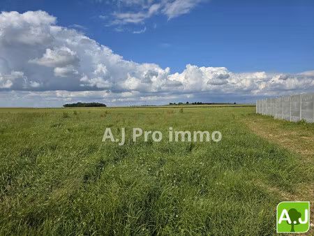 terrain à bâtir ~900 m²