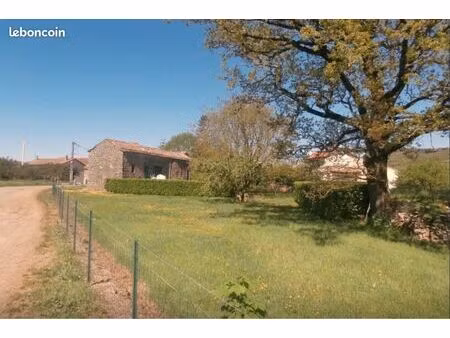 bâtiment en pierre avec terrain sur la commune de le clapier 12540