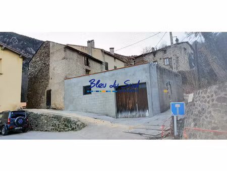maison de village à rénover avec grand garage / atelier et ter