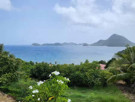 terrain constructible 1986 m2 vue mer proche plage à terre