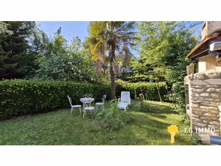 maison de plain-pied  3 ch  garages  terrain de 5 595 m2