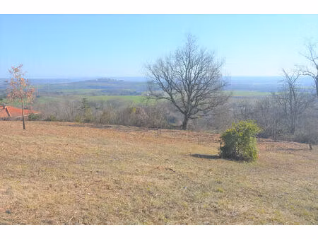 beau terrain de 1138 m2 à l'orée du village vue dégagée