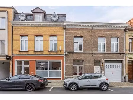 propriété commerciale avec maison/ateliers + jardin et immeu